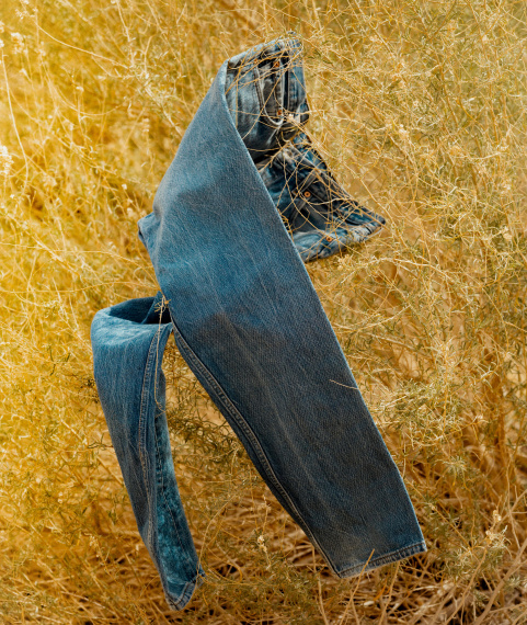 Levi's 501 Denim Floating in field of yellow grass and flowers