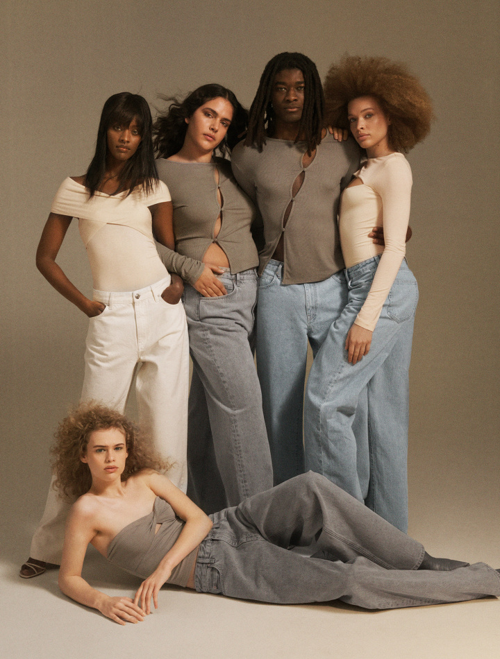 group of women wearing beige and white tops made with circulose by hanna mw in front of beige grey backdrop